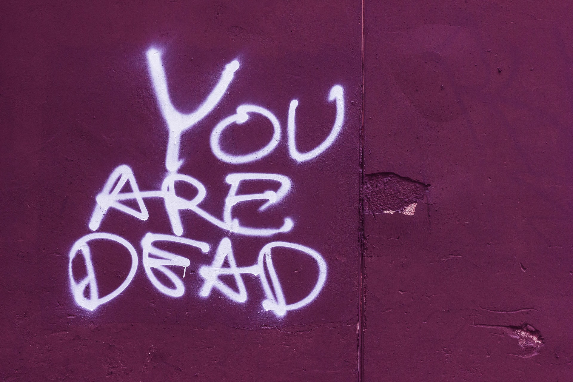 graffiti saying YOU ARE DEAD